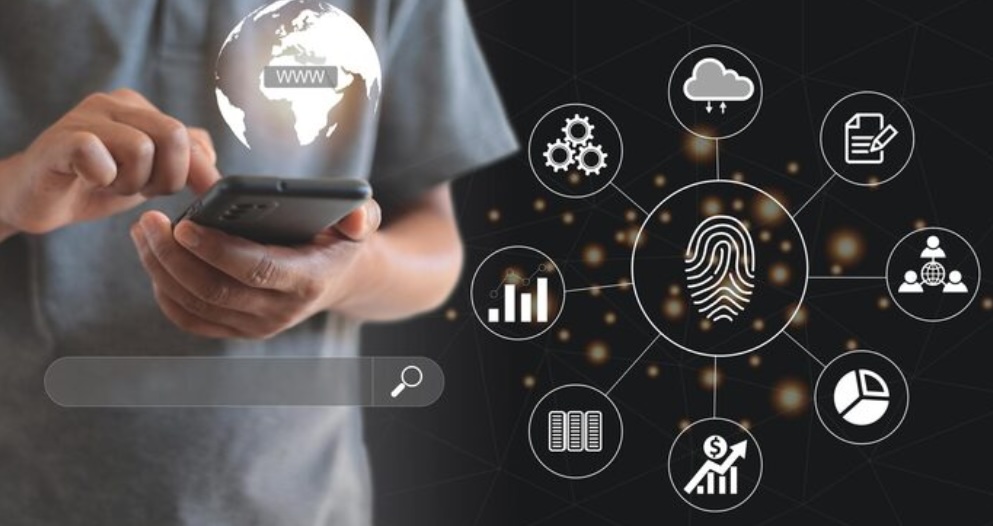 A person managing their digital footprint on a laptop